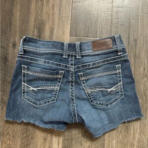 WOMENS BKE CUTOFFS SIZE 27